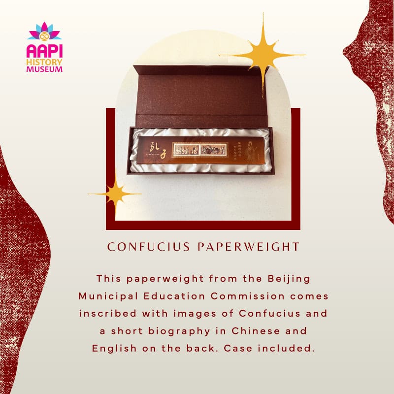 Confucius paperweight from Beijing Municipal Education Commission, featuring Chinese calligraphy, fo.